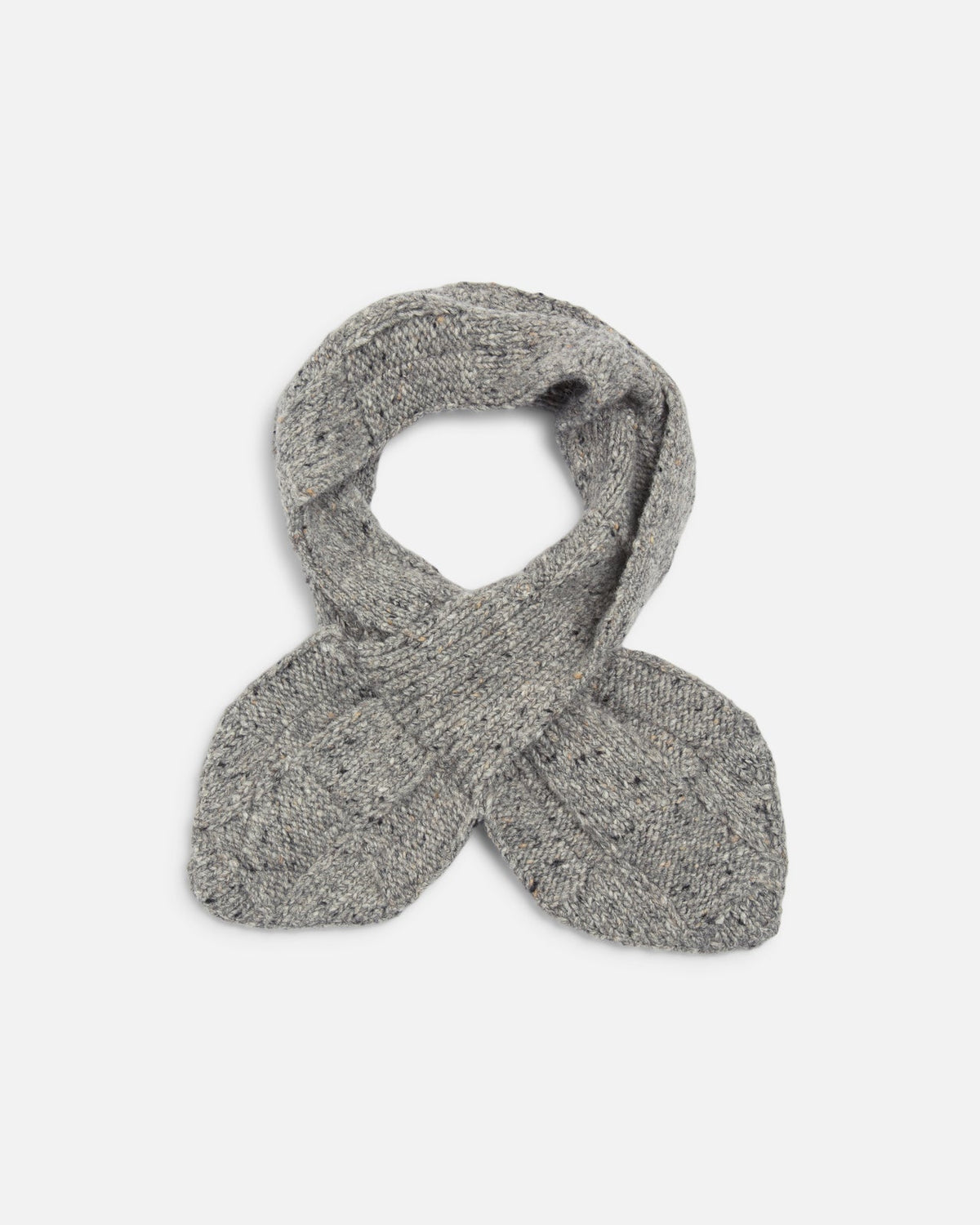 YMC grey knit scarf with a textured, heathered finish, styled in a looped cross-over shape on a plain light gray background.