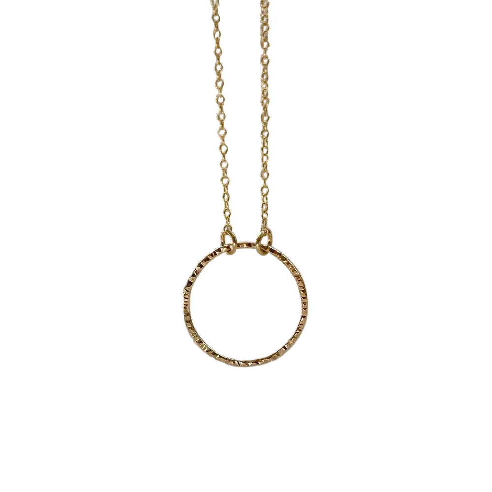 gold necklace on a white background 