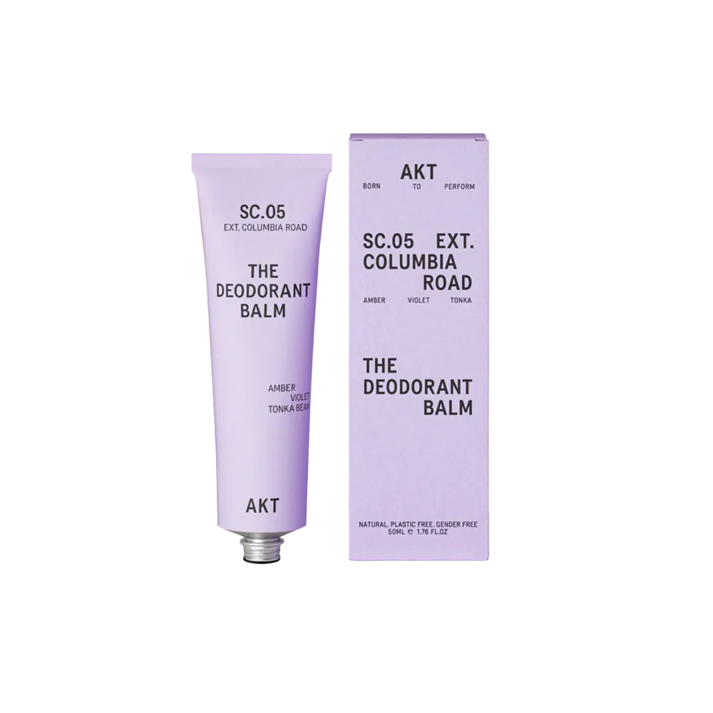 Deodorant balm tube and packaging on a white background