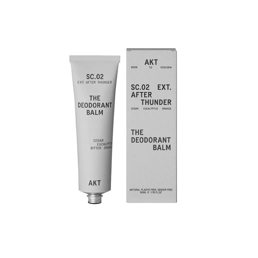 Deodorant balm tube and packaging on a white  background
