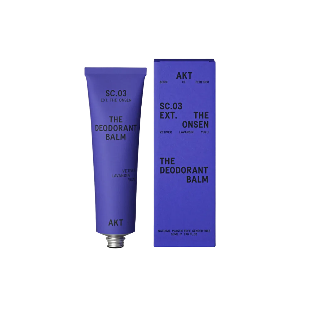 Deodorant balm tube and packaging on a white background