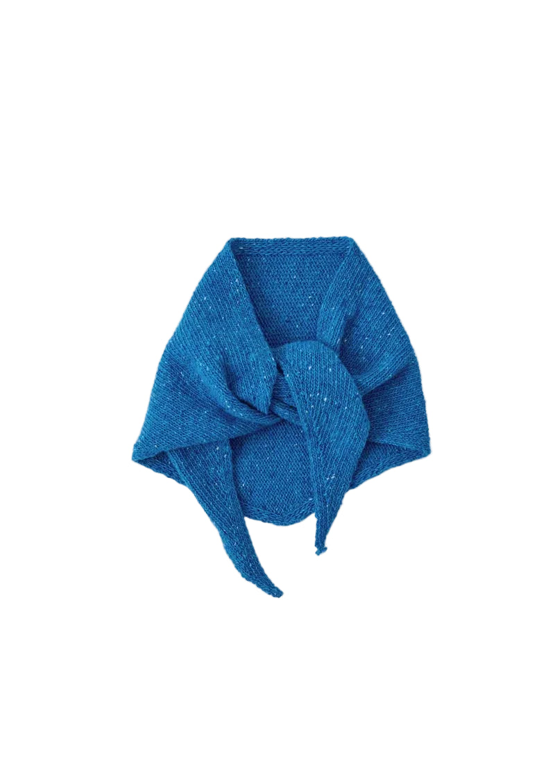 A bright blue knitted scarf with subtle silver glitter flecks, styled in a loose knot on a light gray background.