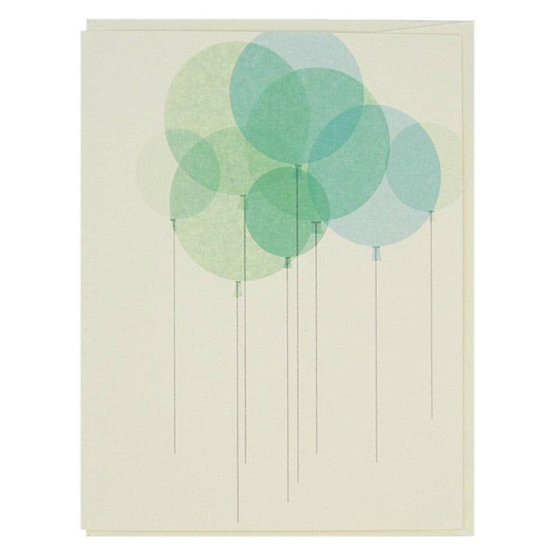 Card with green circular design on a beige background