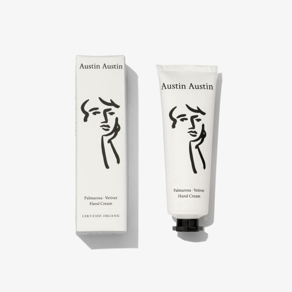 Austin Austin tube of hand cream and packaging on white background