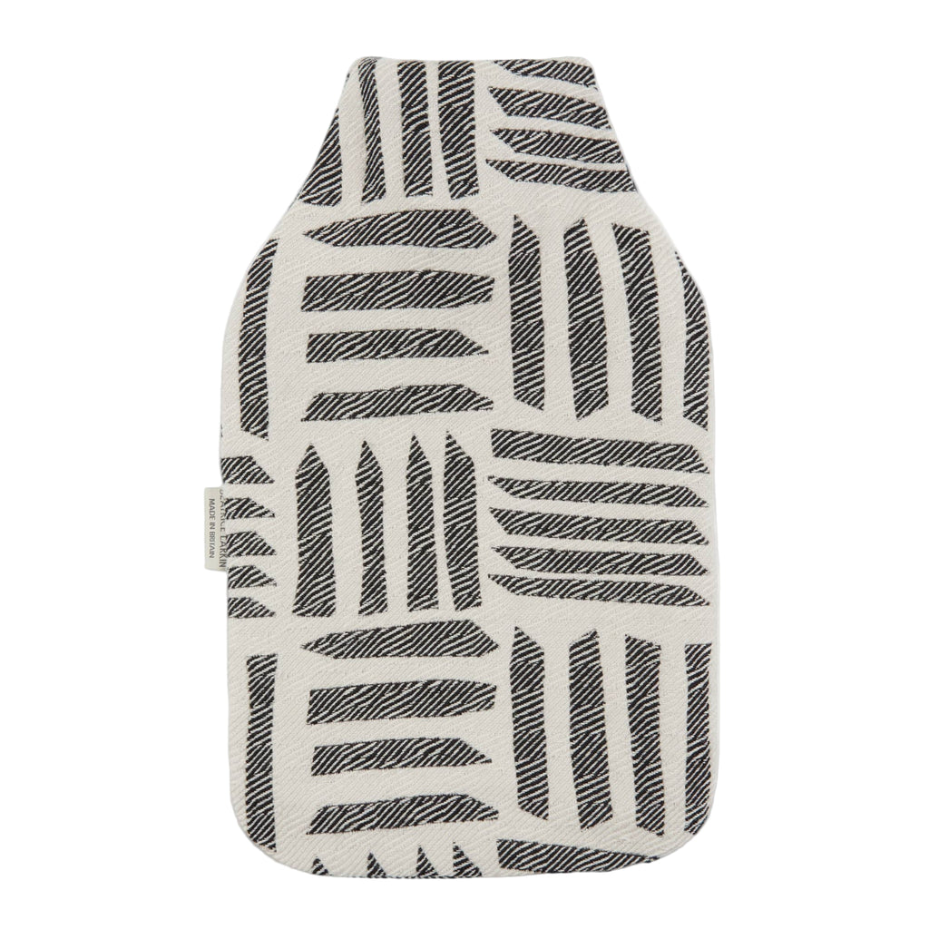 Beatrice Larkin black and white patterned hot water bottle cover on a white background