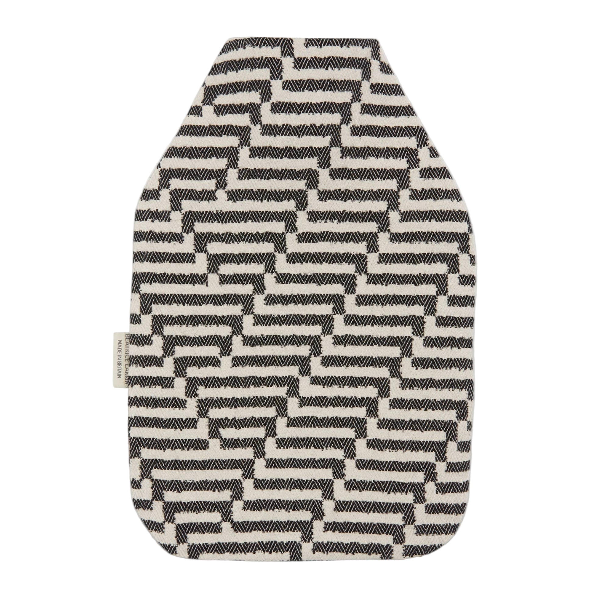Beatrice Larkin Black and white patterned hot water bottle cover on a light gray background