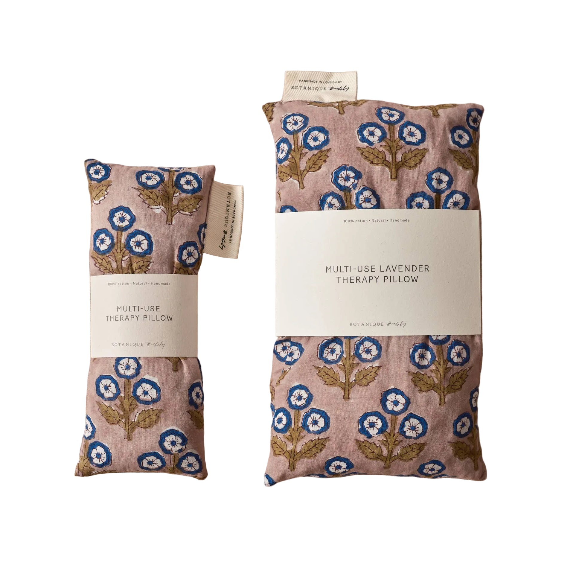 Two floral-patterned therapy pillows on a beige background