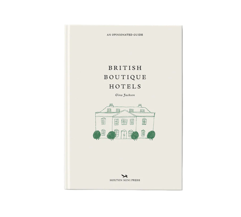 Book titled 'British Boutique Hotels' with a white cover and green text on a gray background