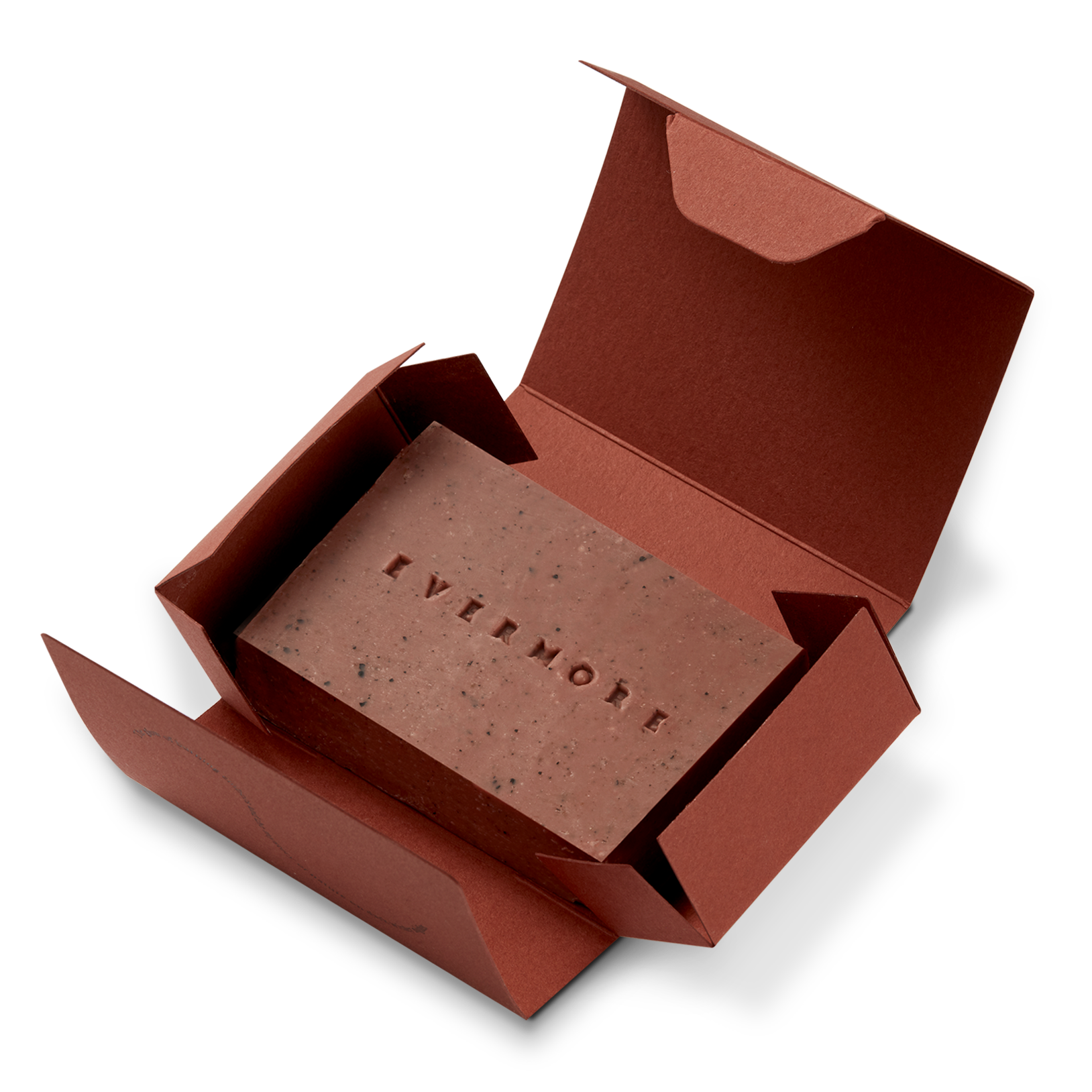 Brown soap bar with 'EVERMORE' branding in an open brown box on a white background