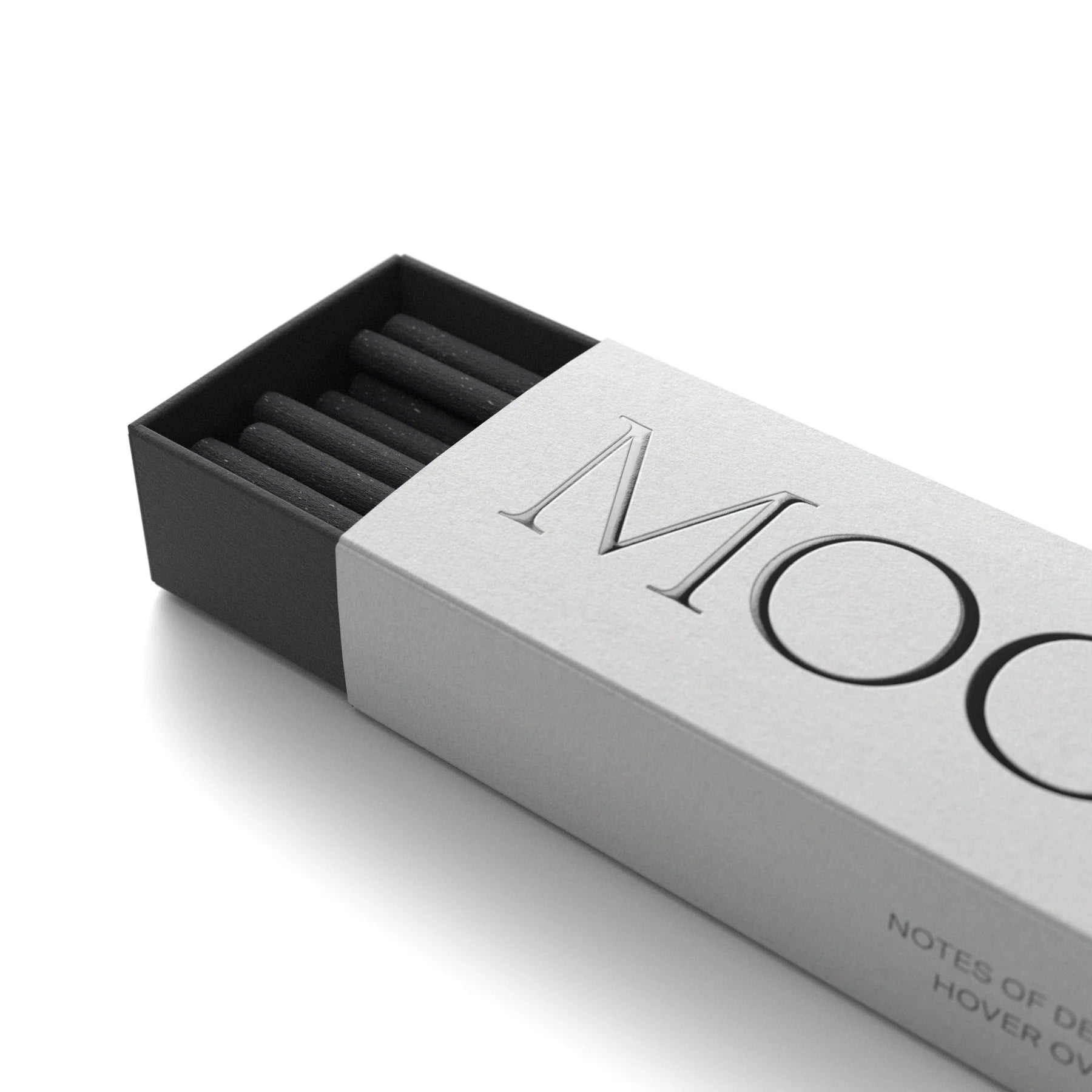 Grey box of Evermore Moon Incense with 'Moon ' branding on a white background