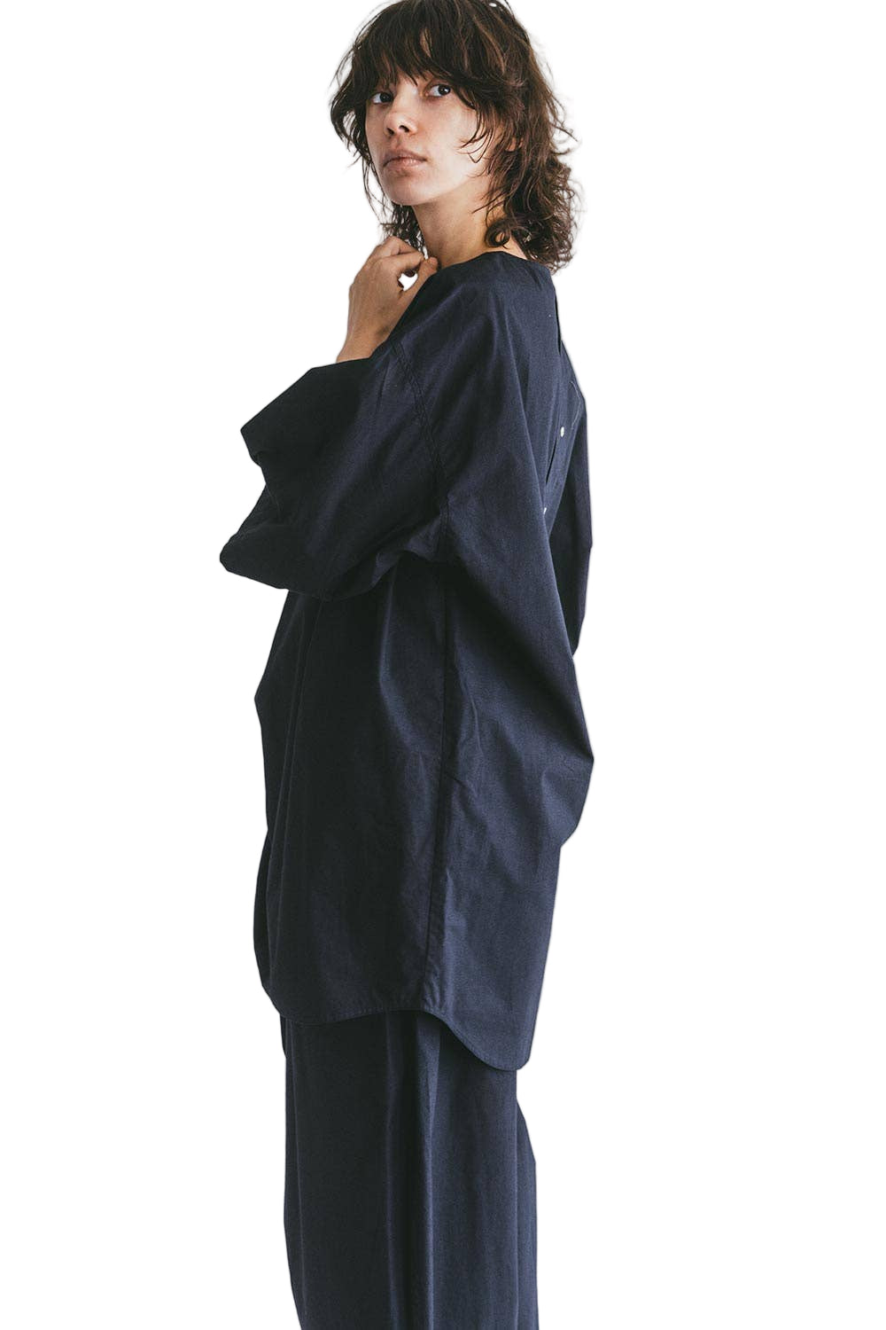 Fog Linen Work Mii Thaaii Oversized Navy Top on a person against a white background. 