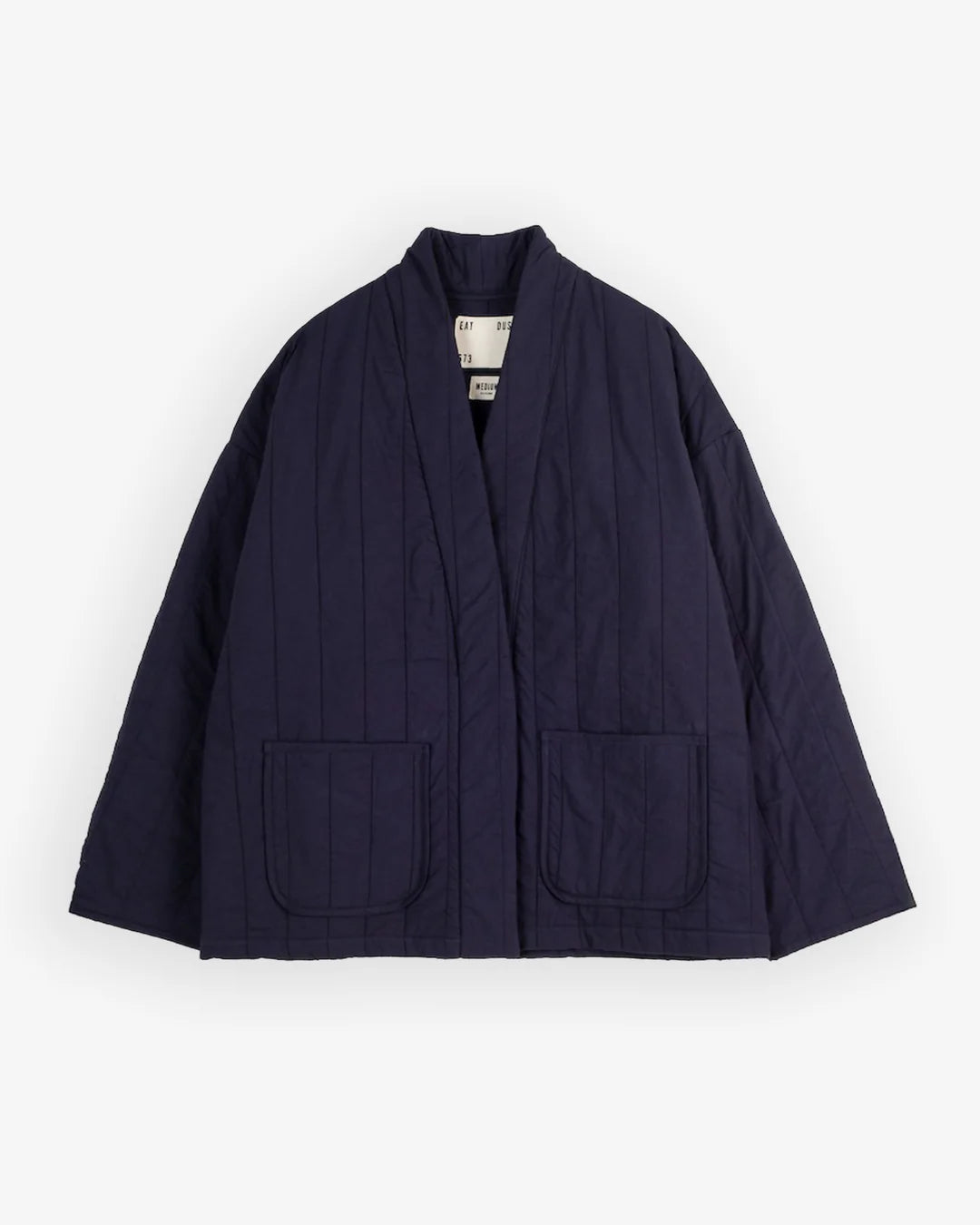 Girls of Dust navy kimono inspired jacket against a white background 
