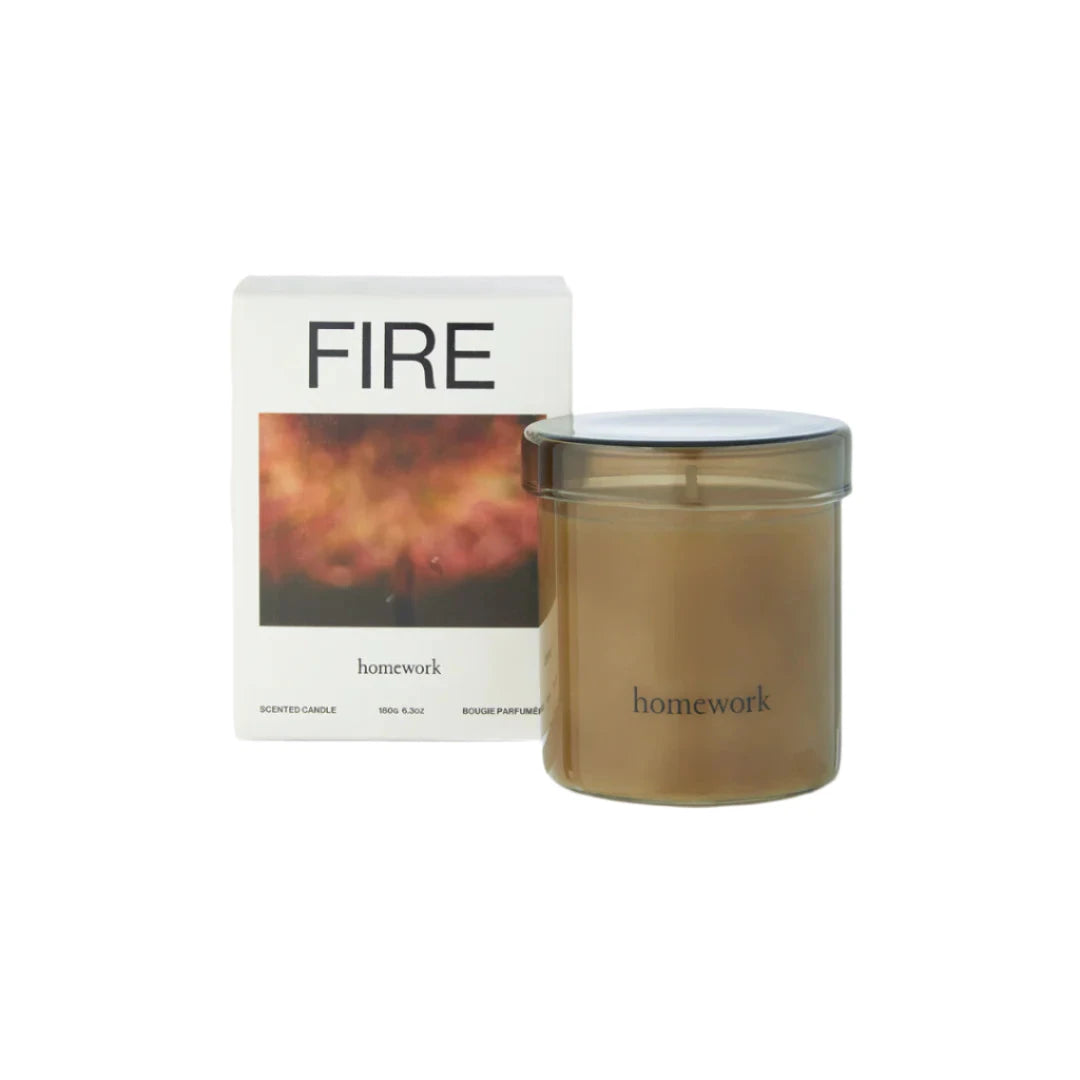 Homework candle labeled 'Fire' with packaging on a white background