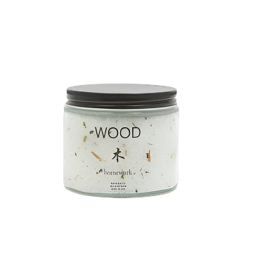 jar labeled 'Wood' by 'homework' on a white background containing white bath salt crystals