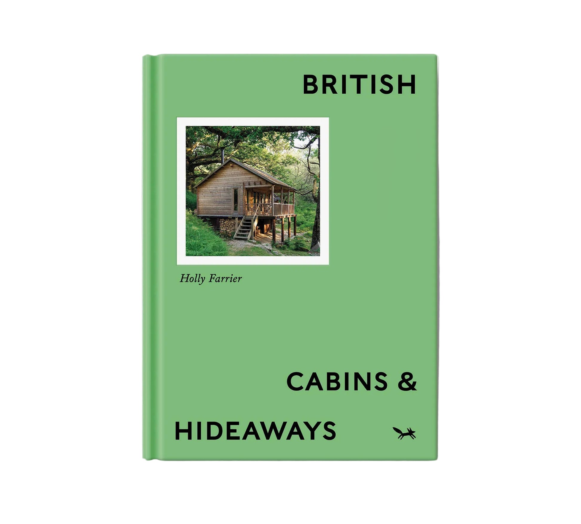 Book titled 'British Cabins & Hideaways' with a green cover and photo of a cabin on a white background