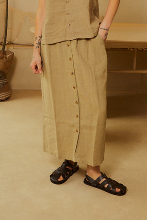 Person wearing the Basic Button Front Skirt LF Markey in a stone colour 