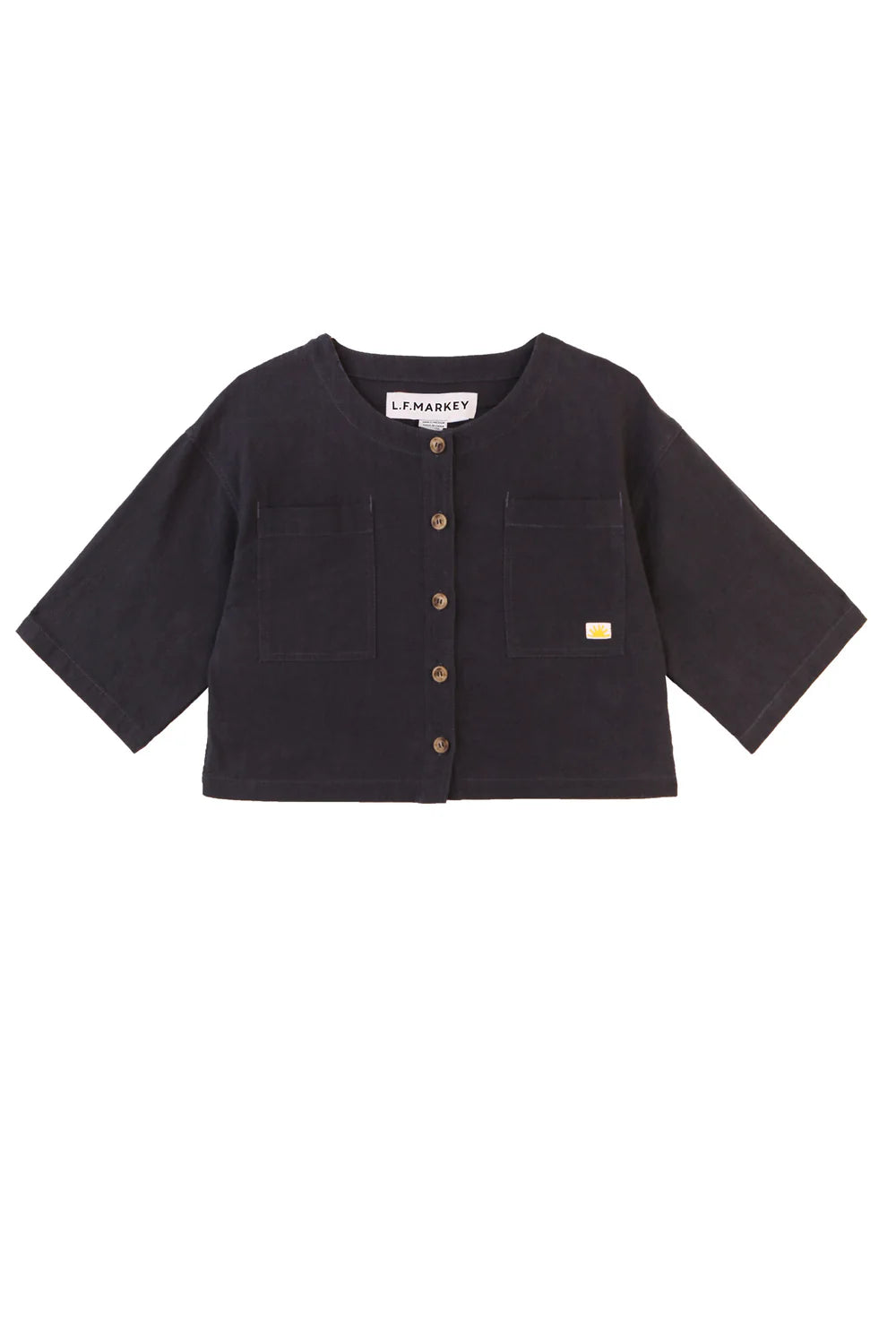 Navy LF Markey top with button details on a white background