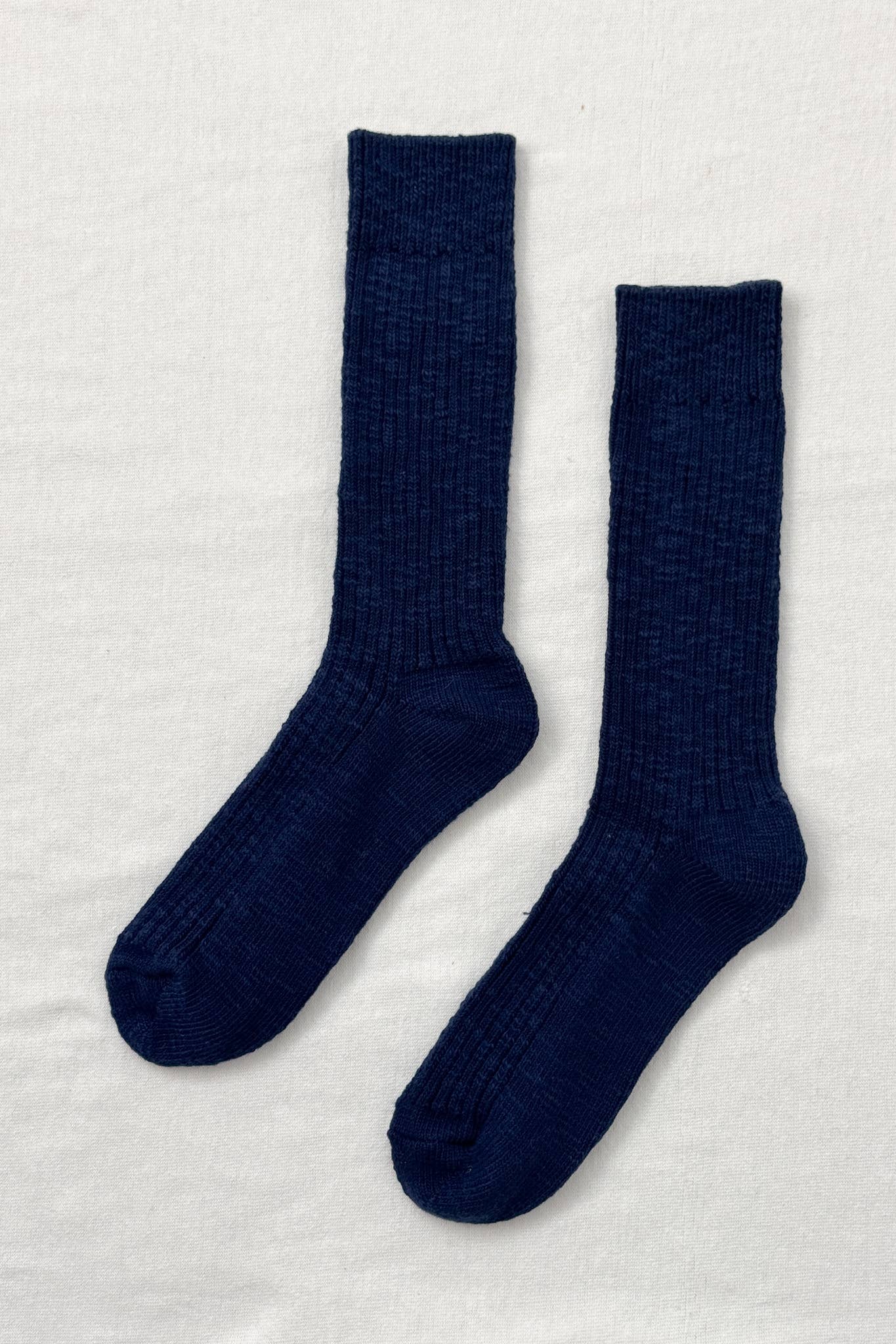 Le Bon Shoppe Navy Cottage sock on a light gray background