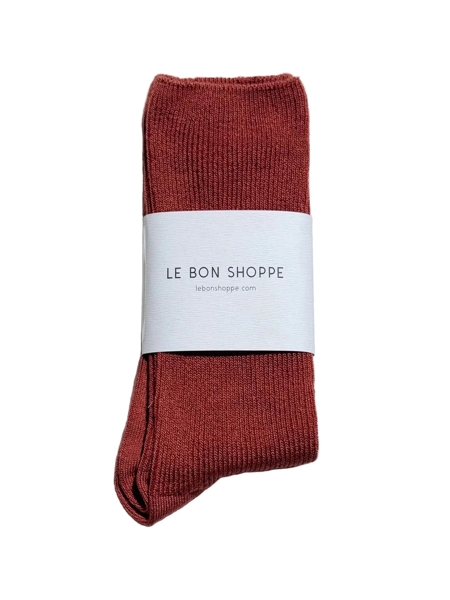 Red / Brown Le Bon Shoppe sock with a white label on a white  background