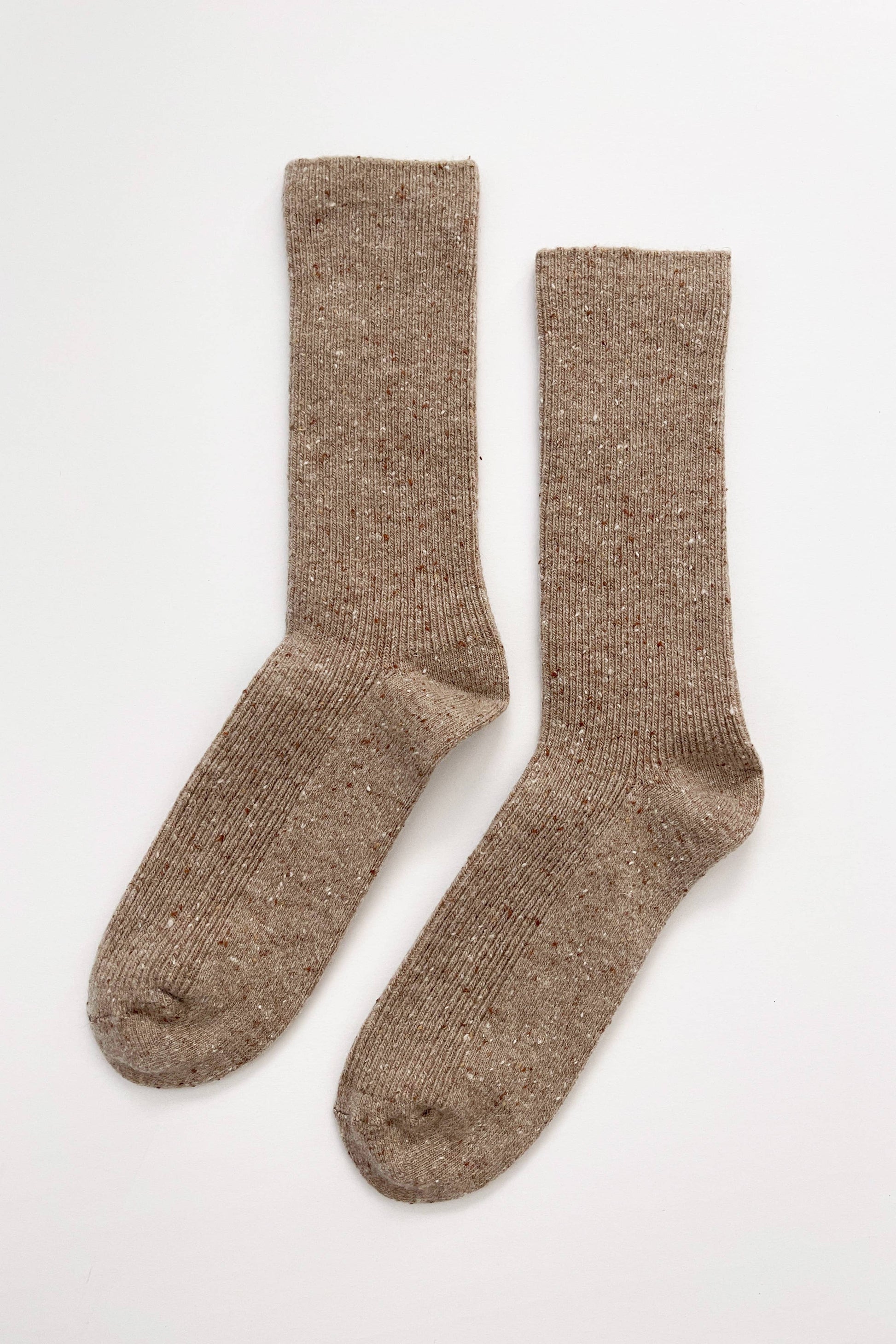 Pair of Le Bon Shoppe brown socks on a white background