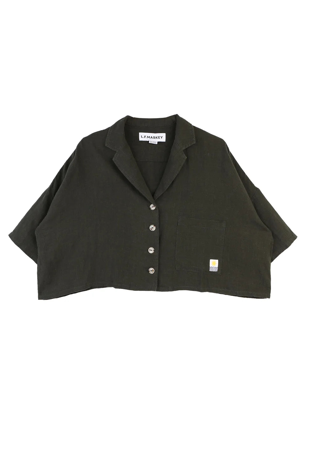 Dark green cropped jacket with button details on a white background