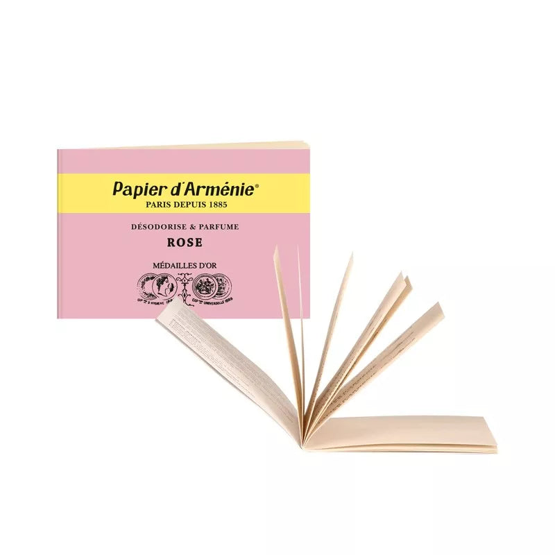 Open Pink Papier d'Arménie fragrance booklet on a white background 