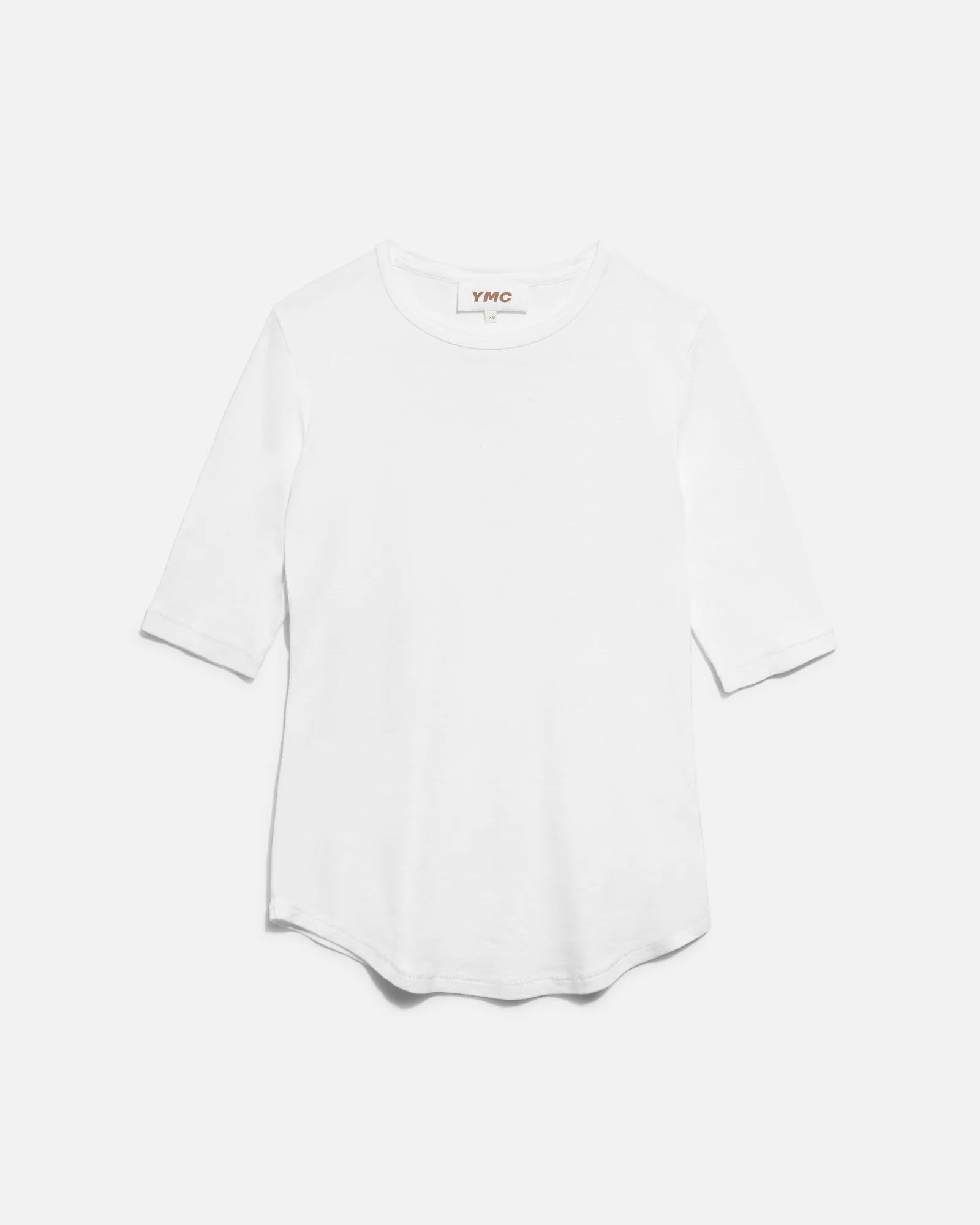 White shirt with a small logo on a white background