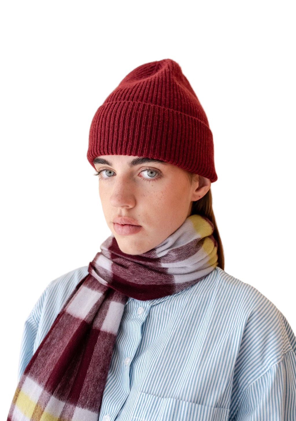 TBCO Burgundy beanie hat on a model against a white background