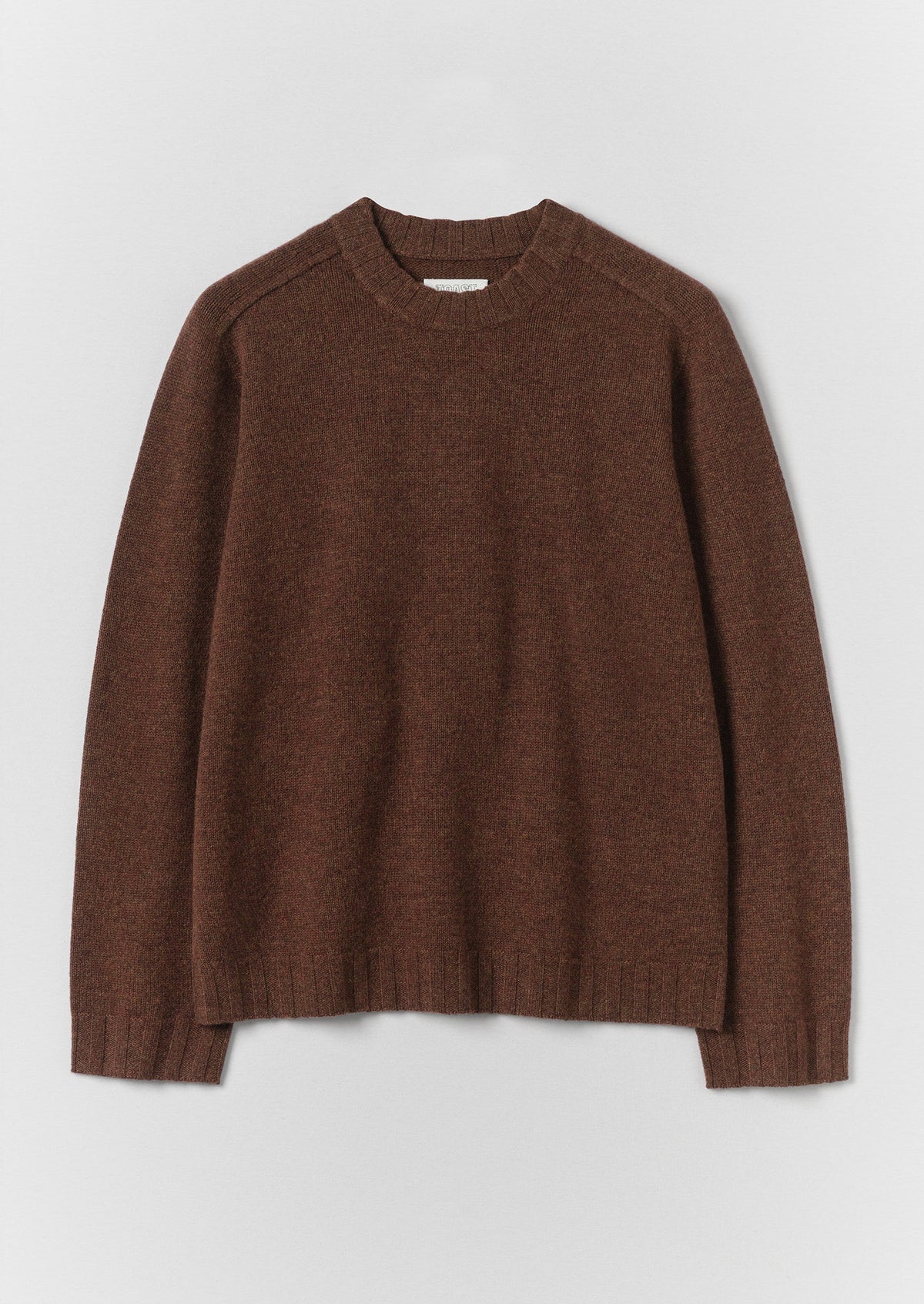 A brown long-sleeve crewneck TOAST Wool Cashmere Sweater in Pecan displayed flat against a light grey background.
