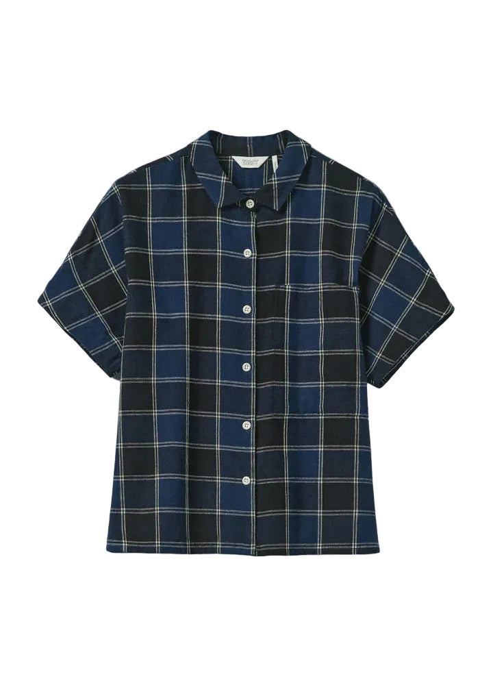 Navy and black plaid shirt on a light gray background