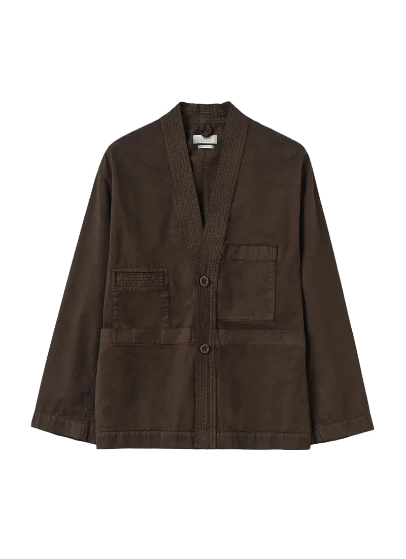 Brown Toast jacket with multiple pockets on a light gray background
