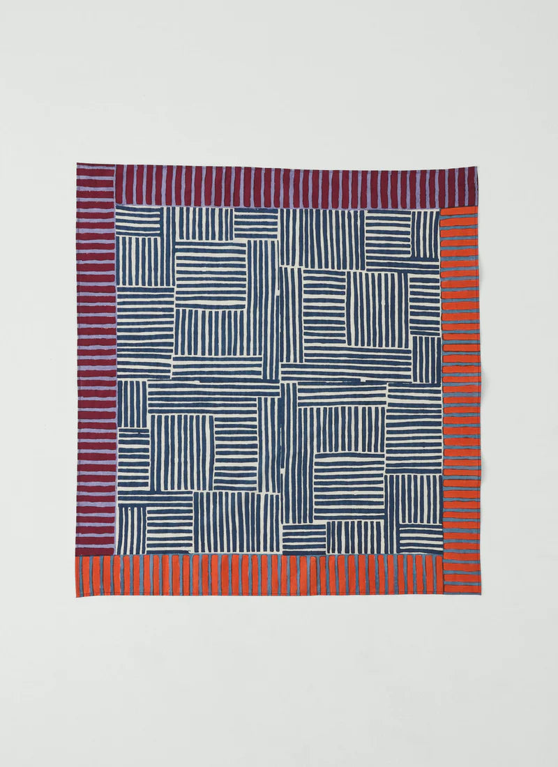 Toast bandana with geometric pattern and colourful border on a white background