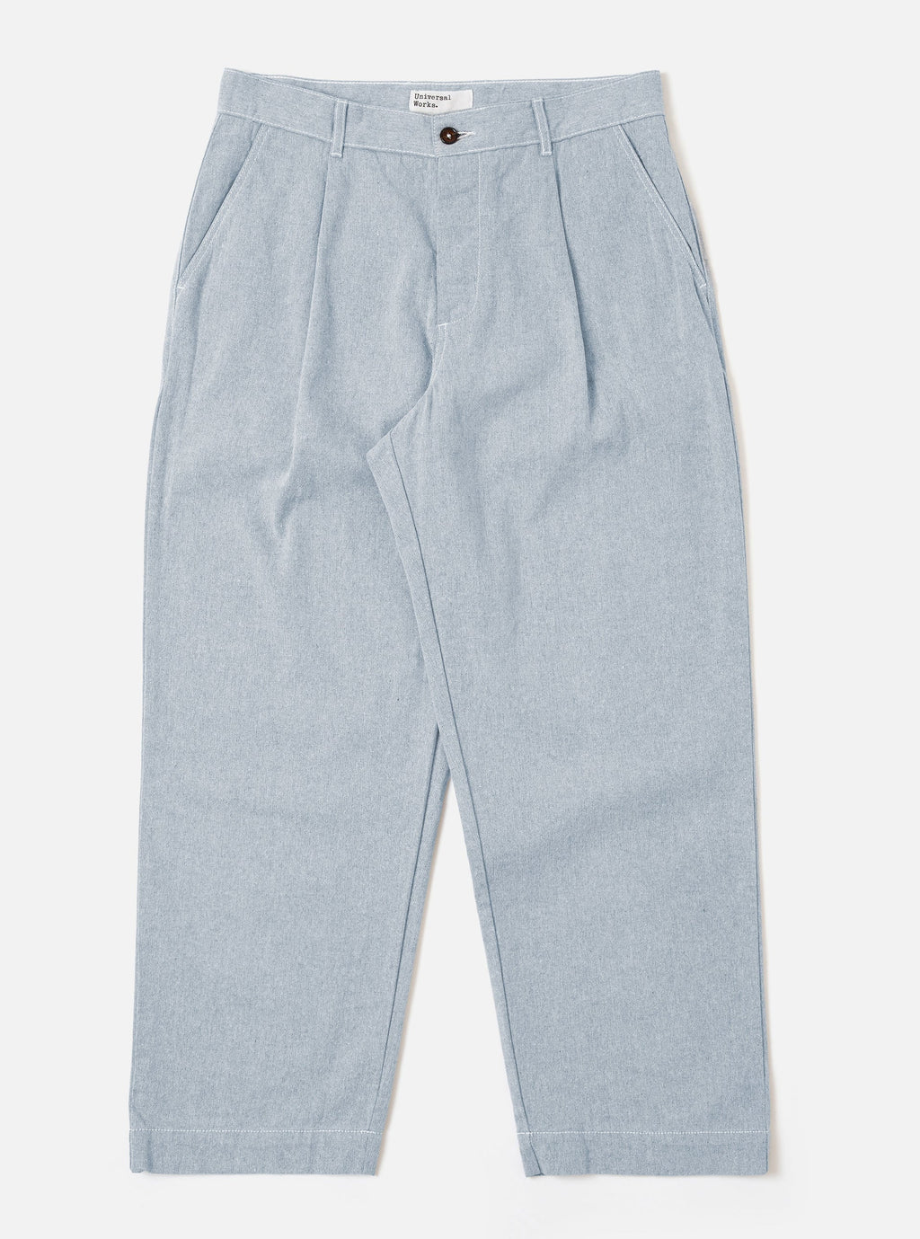 Universal Works Duke Pant in Light Denim against a white background 