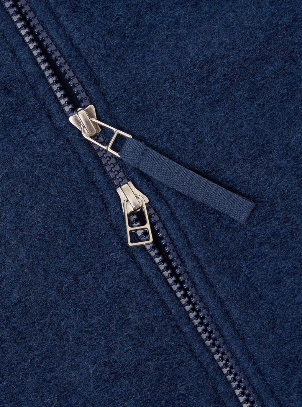 Close up of the double zip detail of the Universal Works Zip Bomber 
