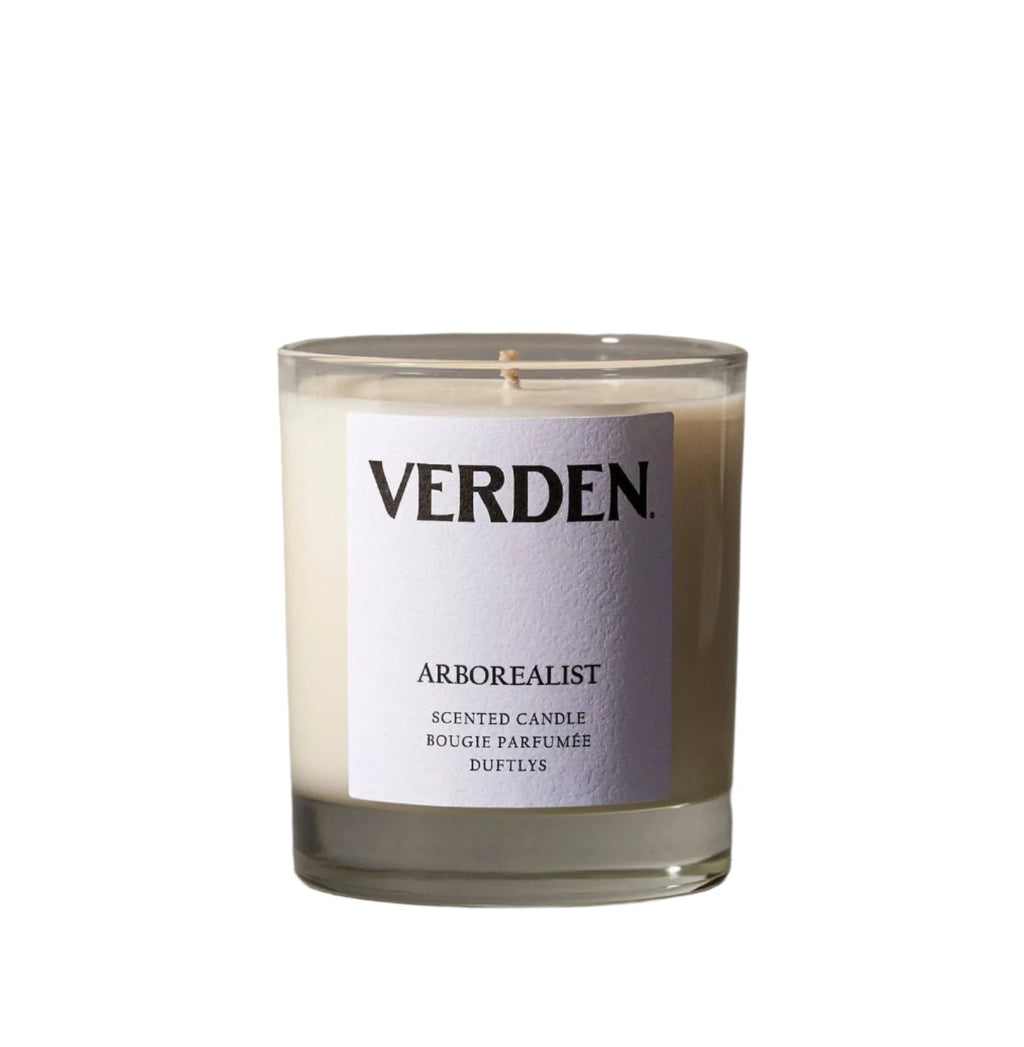 Verden scented candle with a label on a neutral background