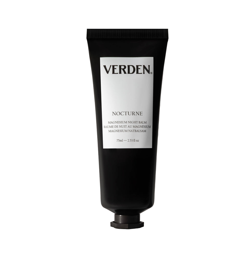 Black tube of Verden Nocturne balm on a white  background