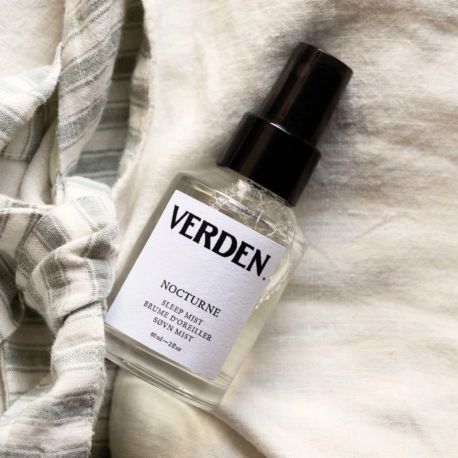Verden sleep mist bottle on a textured fabric background