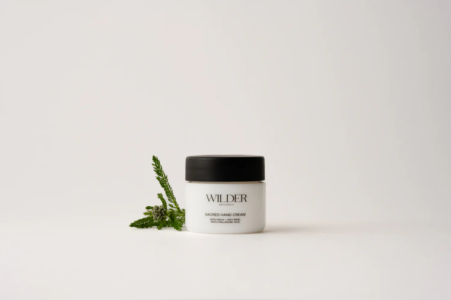 A jar Wilder Botanics Scared Hand on a white background 