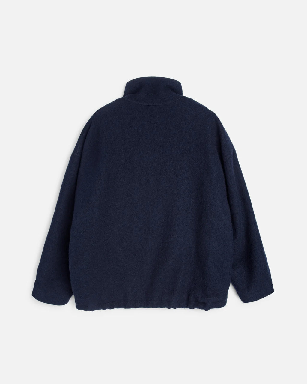 A You Must Create dark navy blue wool Track jacket shown from the back, featuring a mock neck and long sleeves, photographed against a light gray background.