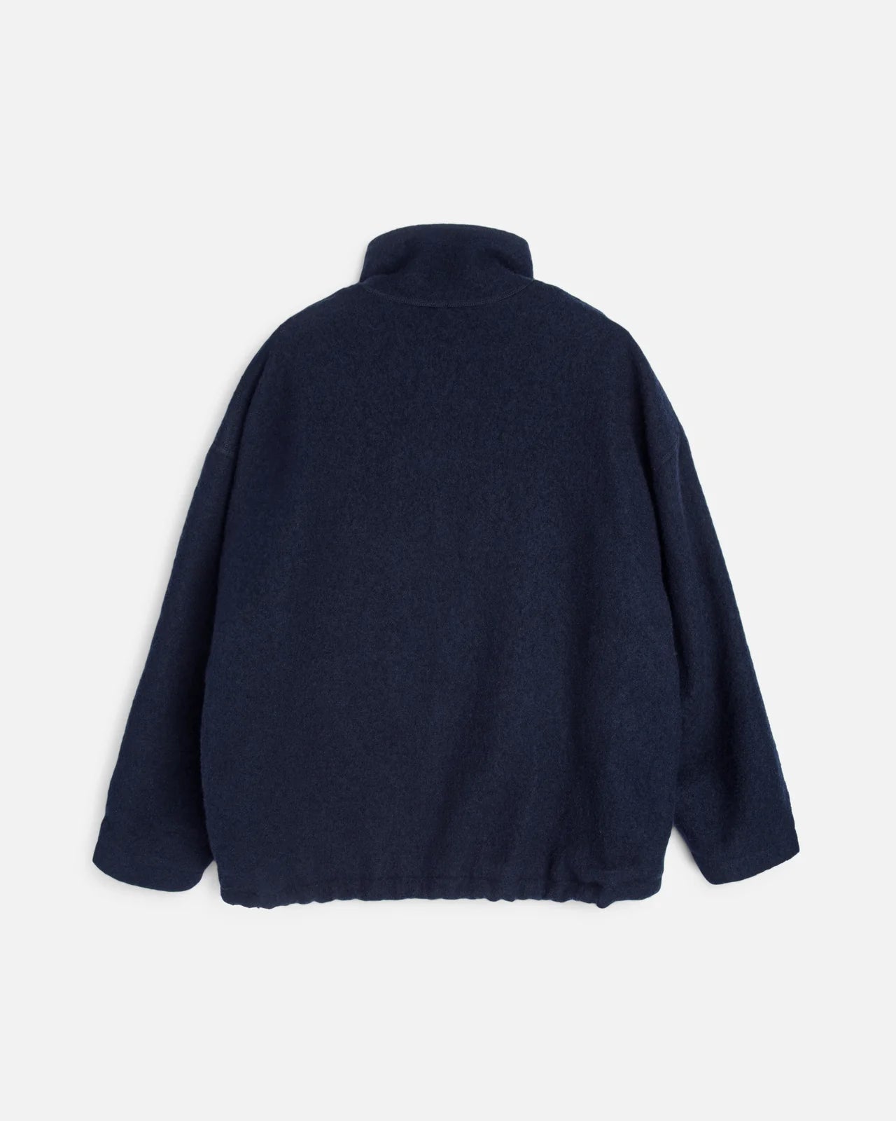 A You Must Create dark navy blue wool Track jacket shown from the back, featuring a mock neck and long sleeves, photographed against a light gray background.