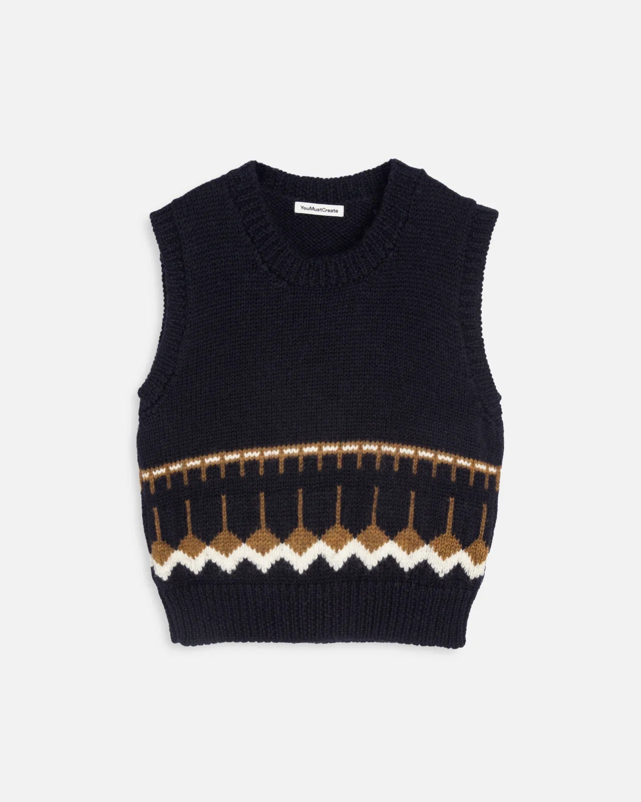 You Must Create Coda Knit Vest in dark navy with a patterned detail at the bottom.  