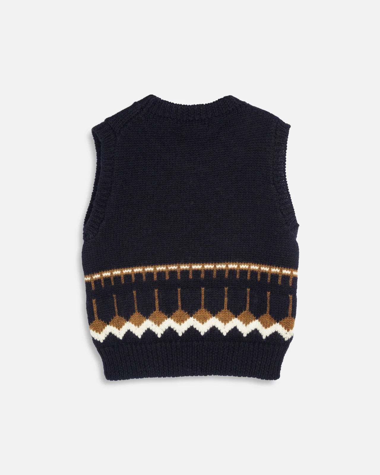 A sleeveless knit sweater vest in dark navy blue, featuring a decorative Fair Isle pattern band around the lower half with brown and white geometric motifs, shown against a light gray background.