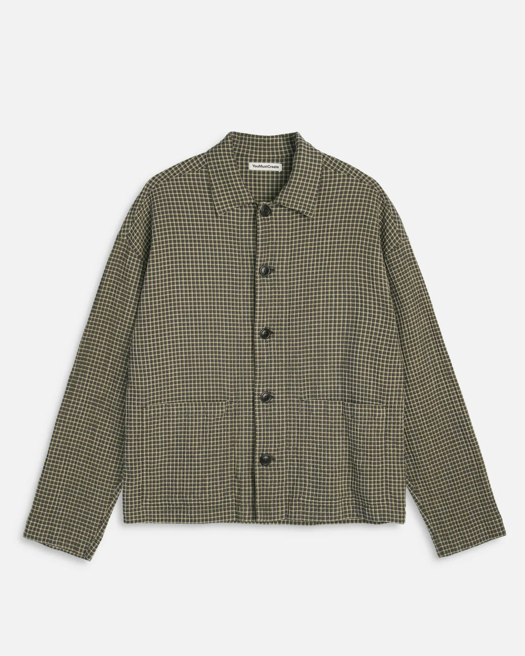 A long-sleeve button-front jacket with a small-scale houndstooth pattern in olive green and black, displayed flat against a light gray background.