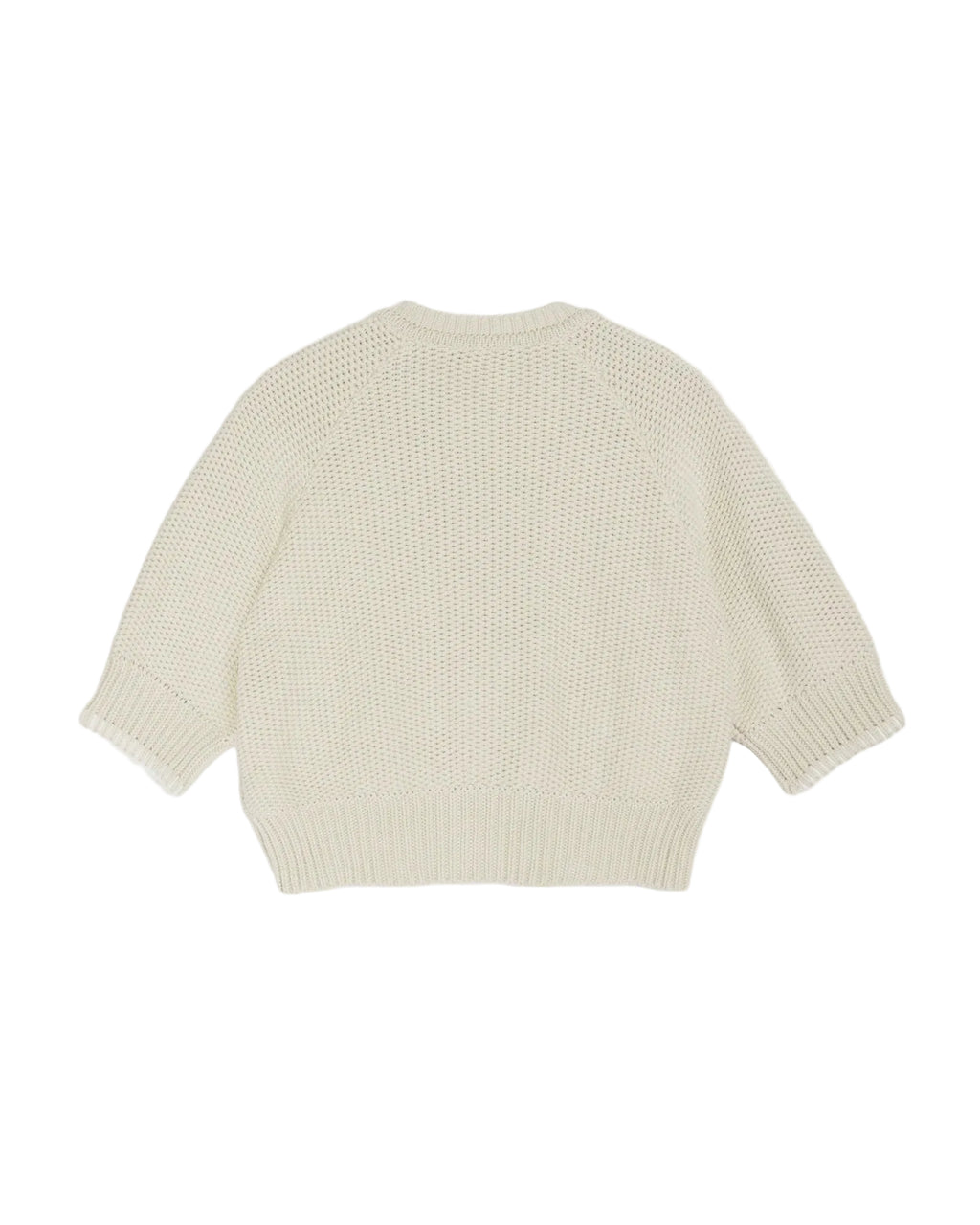Light yellow knitted sweater on a white background