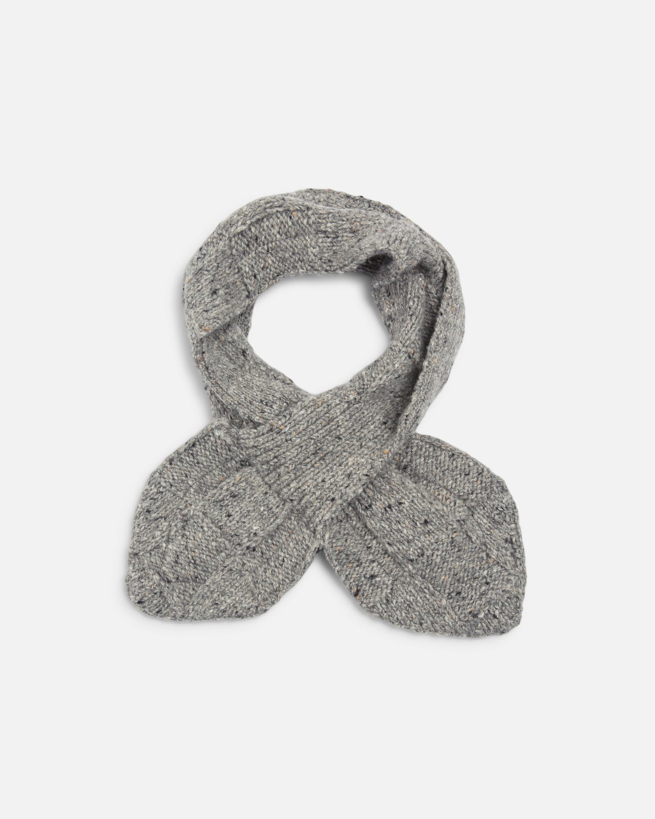 YMC grey knit scarf with a textured, heathered finish, styled in a looped cross-over shape on a plain light gray background.