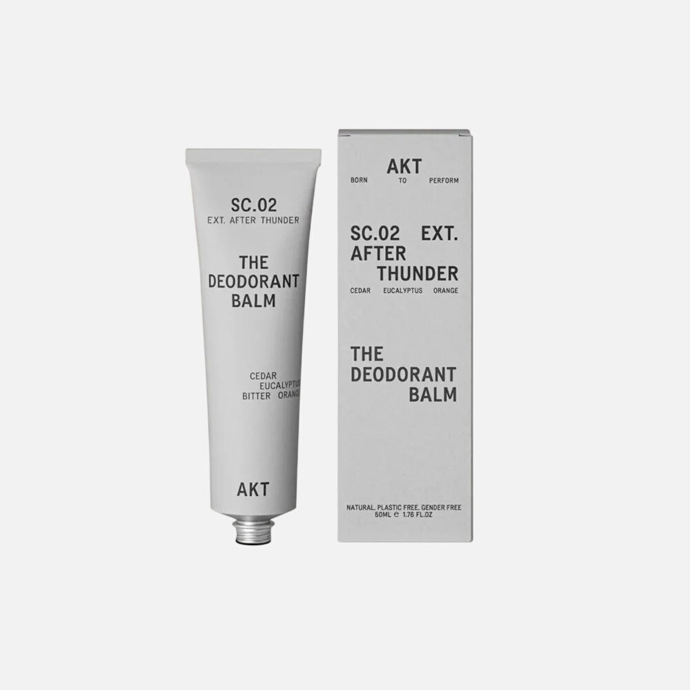Deodorant balm tube and packaging on a white  background