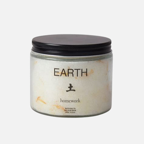 Jar of bath salts labeled 'Earth' on a white background