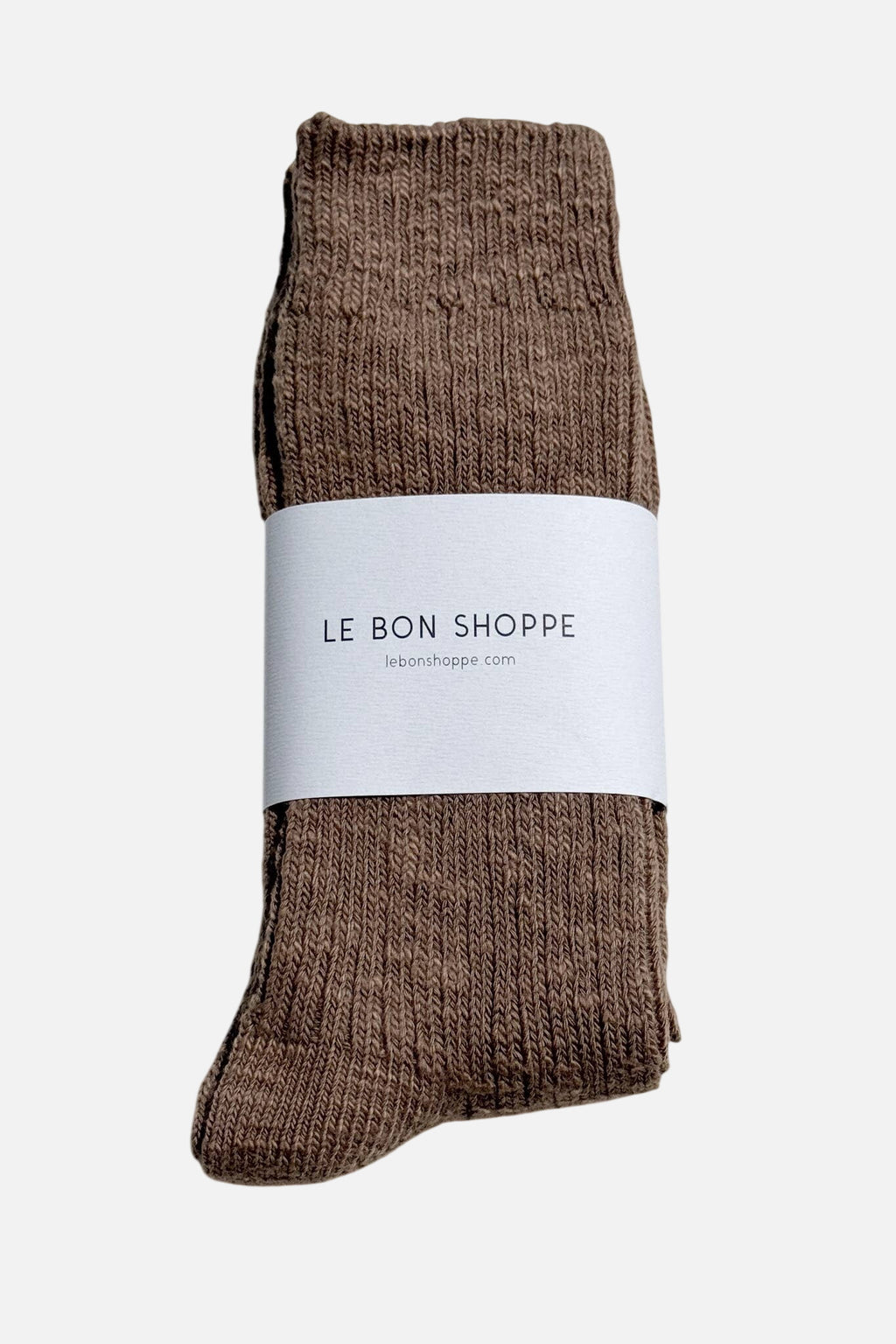 Le Bon Shoppe brown socks with a white label on a light grey background