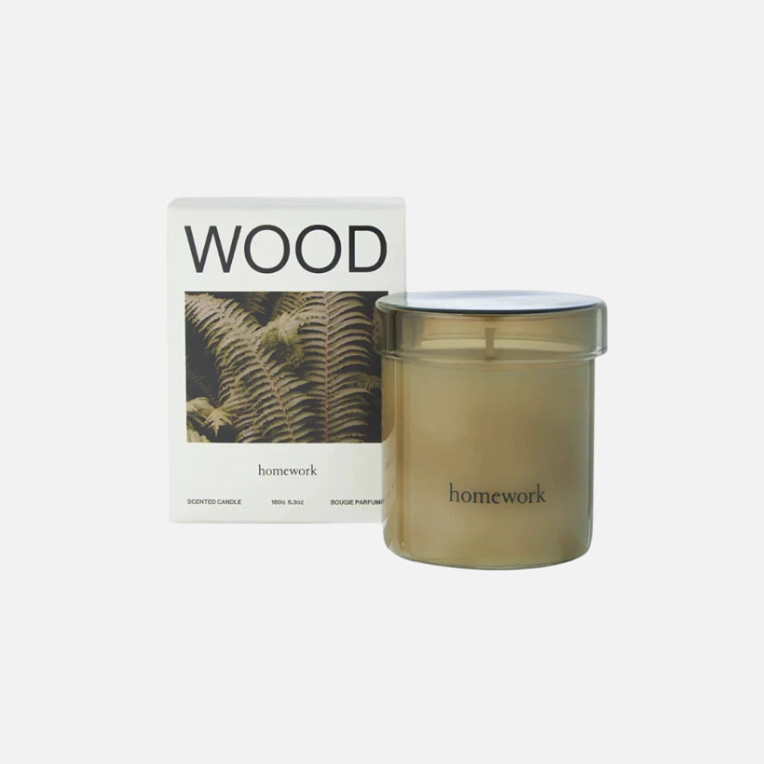 Homework candle with packaging on a white background