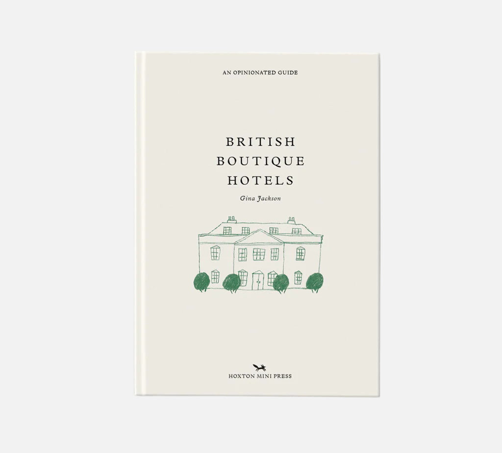Book titled 'British Boutique Hotels' with a white cover and green text on a gray background